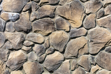 On from stone bricks as an abstract background. Texture