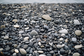 A peaceful beach cove nestled along Iceland's southern coast, with tranquil waters, smooth pebbles, and a backdrop of rolling hills, offering a serene and secluded retreat for those seeking solace in