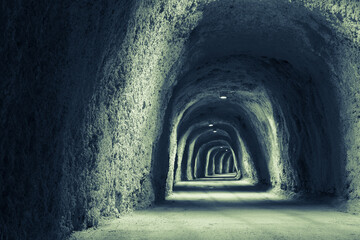 Illuminated Mountain Tunnel. The long tunnel for a poster, calendar, post, screensaver, wallpaper,...