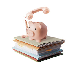 Piggy bank telephone on a pile of paperwork