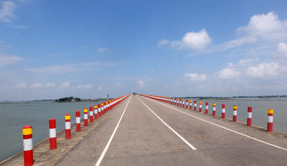 Nikli Kishoreganj is a mind-blowing road passing between water and sky on both sides. Natural view...