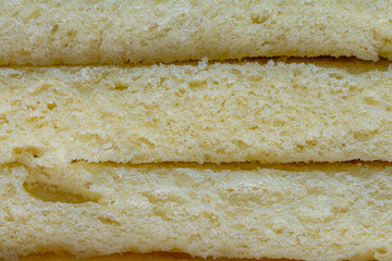macro bread texture,Close up shot of a bread background texture. Macro bread slice texture pattern.