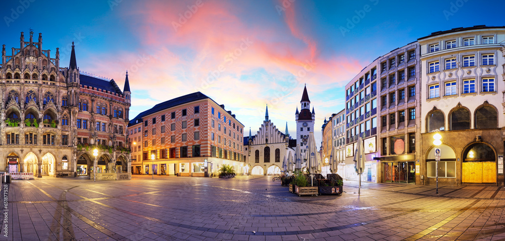 Wall mural munich - germany, panoramic view of marienplatz at dramtic sunrise with red clouds - nobody