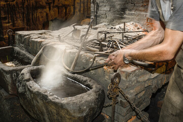 Ferron working in the forge of the El Pobal ironworks