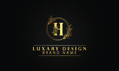 Letter H luxury circle flourish shape logo design template with black background
