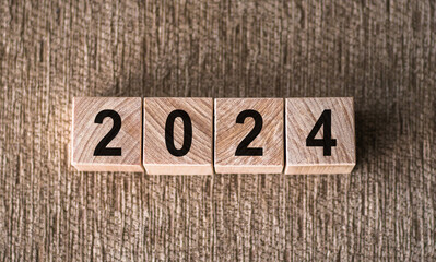 Fototapeta premium New year 2024. Wooden cube blocks.