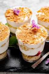 Catering buffet for events. Desserts in glass cups