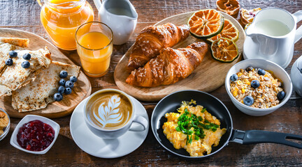 Breakfast served with coffee, eggs, cereals nd croissants