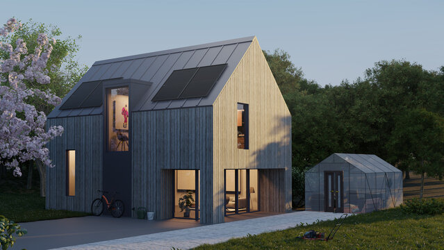 Holzhaus mit Solarmodulen in der D&auml;mmerung