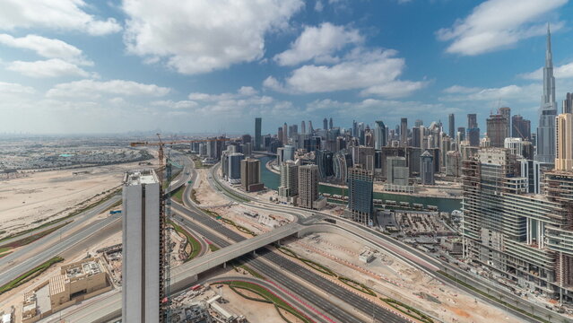 Panorama showing skyline of Dubai with business bay and downtown district.