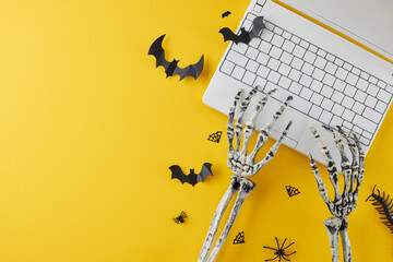Finding unique Halloween gifts through online retailers. Top view flat lay of laptop, skeleton...