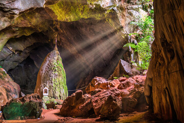 Light rays inside of the Sadan cave near Hpa-An in Myanmar