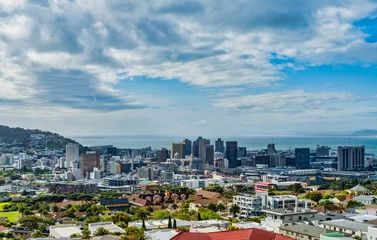Tableaux ronds sur aluminium Montagne de la Table Cape Town city centre buildings and atlantic ocean with white clouds and blue sky, Cape Town, South Africa
