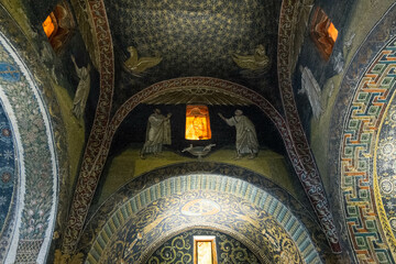 Alabaster windows and mosaics at the interior of the Mausoleum of Galla Placidia, Ravenna, Italy