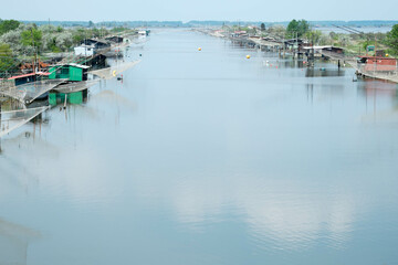 Fototapeta premium Traditional fishing lodges in Valli di Comacchio, Emilia-Romagna, Italy