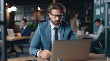 Busy business man manager employee wearing suit using laptop in company office