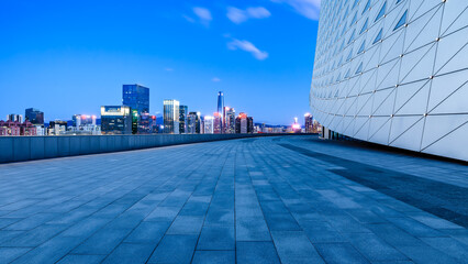 City square and skyline with modern buildings scenery at night