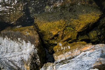 Top view on stones near sea, nature background