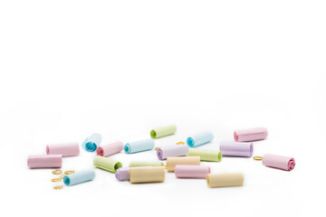 Colorful paper note with gold rings isolated on white background. A way to send special message to someone. spot focus and copy space