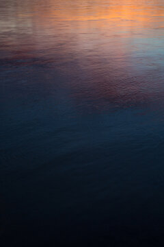Sunset reflection on the surface of the Yukon River, in Yukon Charley National Preserve, Alaska. 