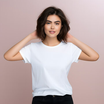 white t-shirt, showcasing the garment’s fit and style against a neutral background