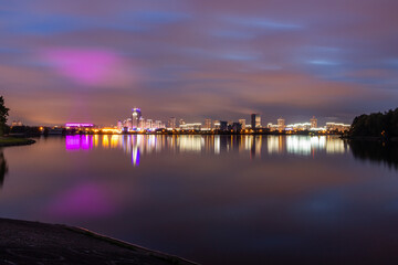 Night Minsk city reflected in the lake