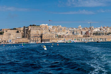 Valletta, Malta, May 1, 2023. View of the capital from the sea, Upper Barakka Gardens, cannons and lift