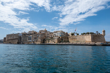 Fototapeta na wymiar Valletta, Malta, May 1, 2023, Grand Harbor seen from Upper Barakka Public Gardens