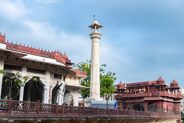 ancient artistic holy jain temple with holy pillar and cloudy sky at morning