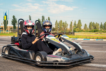 twin racing go kart for two girls driving