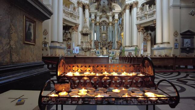 Memorial candles in the Dominican Cathedral in Lviv, Ukraine