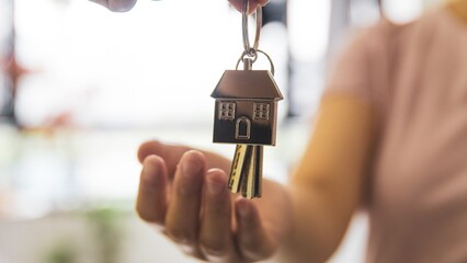 Giving keys to new house owner - Powered by Adobe