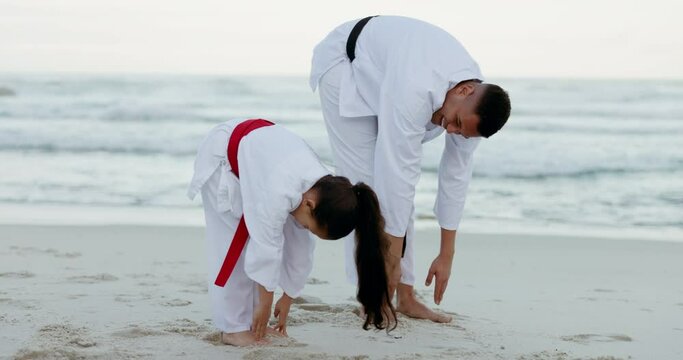 Beach, karate or stretching with father and daughter together outdoor for a self defense workout. Fitness, family or kids with a man parent and girl child getting ready for fight exercise by the sea