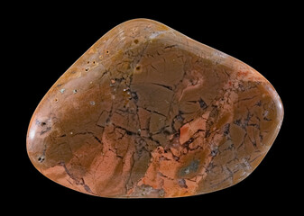 Photograph of a Cut, Polished Natural Jasper Stone, Spotted in Brown Tones. Isolated On Black Background