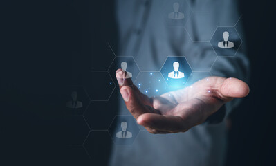 hr, employment, career, occupation, employee, recruitment, candidate, hiring, management, manager. close up to hand then hold talent candidate icon, select applicant then put in them to right job.