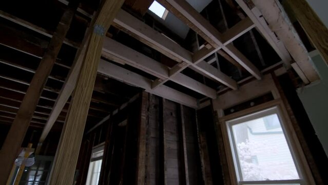 Elements of reconstruction of an old house. replacement of old wooden beams