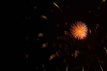 New Year's fireworks in the sky. Fireworks in the dark sky