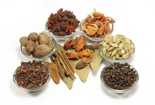 Variety of spices in glass bowl, ingredients for Khada garam masala, indian spice mix