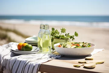 Gordijnen table with fresh salad at the beach © D. Ott