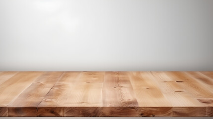Empty brown wooden table over white concrete wall background. For product display montage.