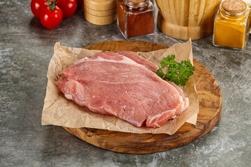 Raw pork schnitzel for cooking