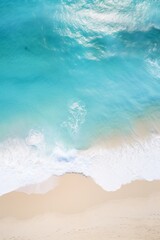 Overhead view of beautiful crystal water waves washing onshore on a pristine beach, sunny day. Tropical shoreline. Aerial drone like view. Generative AI.

