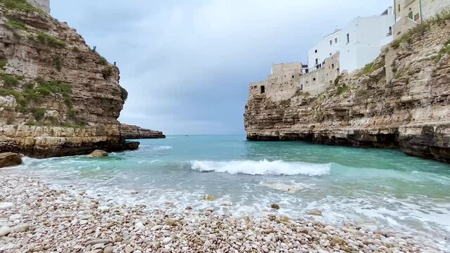 Beach Lama Monachile or Cala Porto in Polignano a Mare in southern Italy