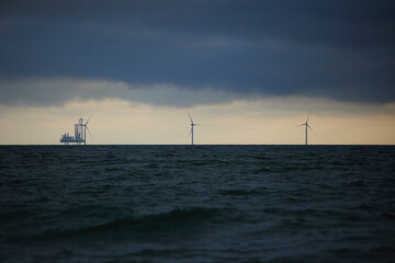 Station for installing a wind generator at sea. Evening in Denmark