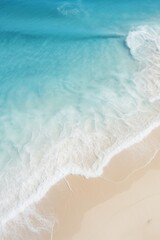 Overhead view of beautiful crystal water waves washing onshore on a pristine beach, sunny day. Tropical shoreline. Aerial drone like view. Generative AI.
