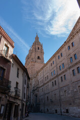 Naklejka premium Tower of a church among the streets of an ancient city.