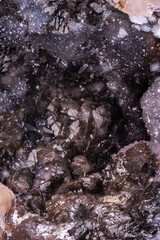 calcite geode macro detail texture background. close-up raw rough unpolished semi-precious gemstone