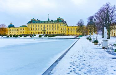 Fototapeta na wymiar View of Drottningholm Palace near Stockholm in Sweden in winter.