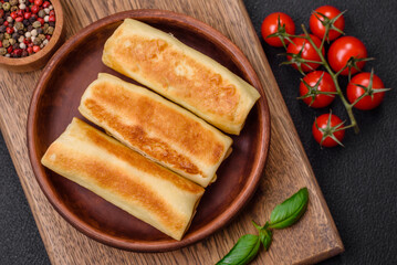 Delicious fresh homemade fried pancakes with broccoli and meat or fish