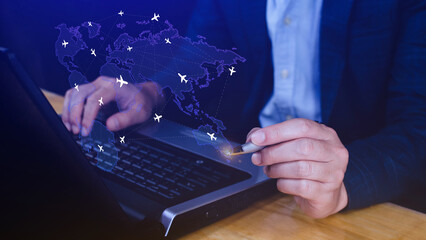 Businessman hand pushing flight booking networking, Hand pressing light blue world map with flight...